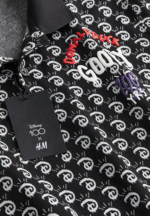 H&M - Regular fit jacquard-knit polo shirt - black/disney100