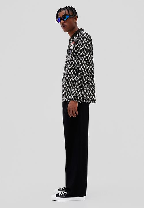H&M - Regular fit jacquard-knit polo shirt - black/disney100