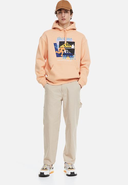 H&M - Relaxed fit printed hoodie - apricot/the time is now