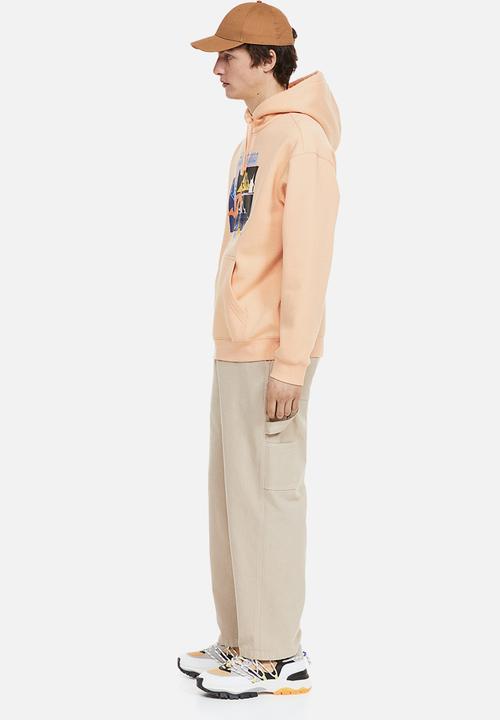 H&M - Relaxed fit printed hoodie - apricot/the time is now