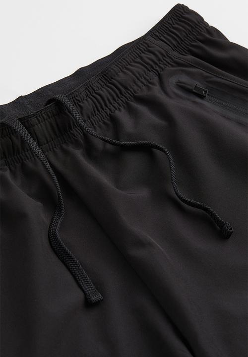 H&M - Sports shorts - black