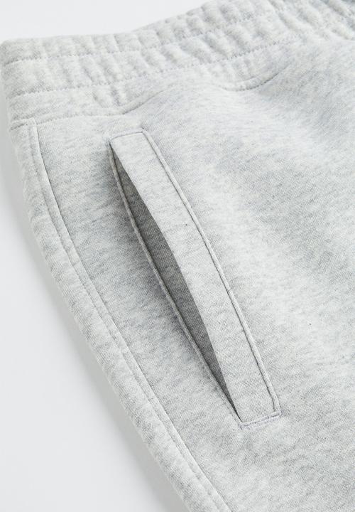 H&M - Loose fit printed sweatpants - light grey marl/varsity