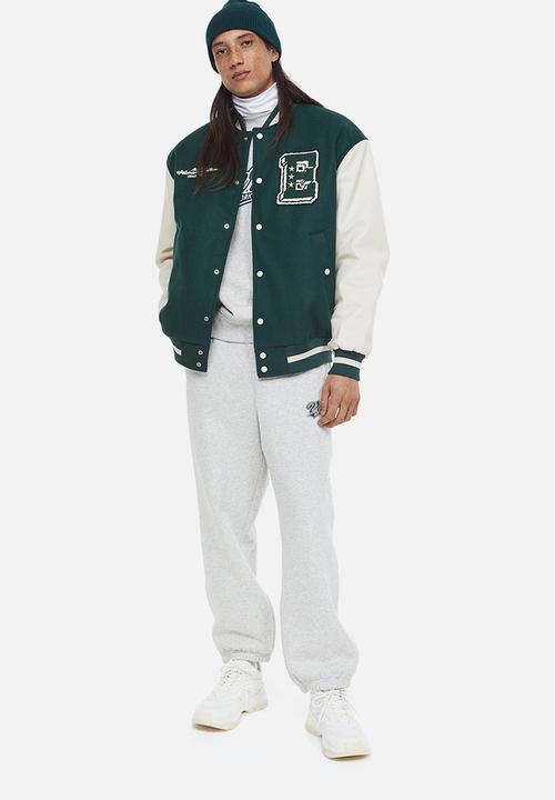 H&M - Loose fit printed sweatpants - light grey marl/varsity
