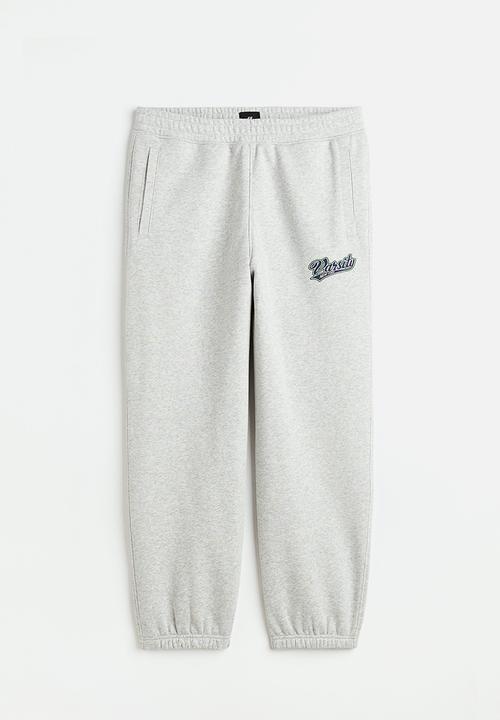 H&M - Loose fit printed sweatpants - light grey marl/varsity