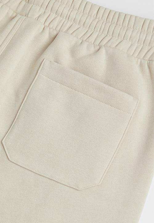 H&M - Regular fit sweatshorts - light beige