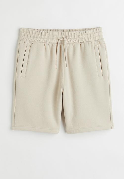 H&M - Regular fit sweatshorts - light beige