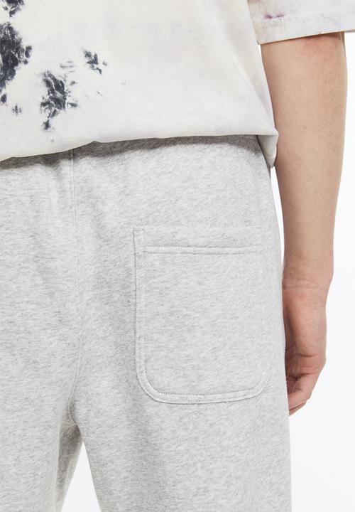 H&M - Regular fit cotton sweatpants - light grey marl