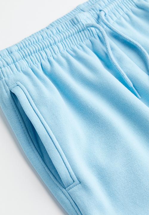 H&M - High-waisted joggers - light blue 