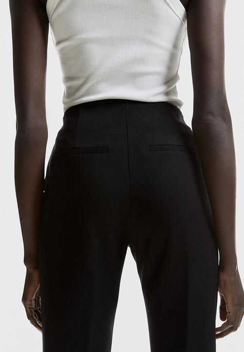 H&M - Flared trousers - black