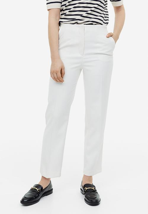 H&M - Tapered trousers - cream 
