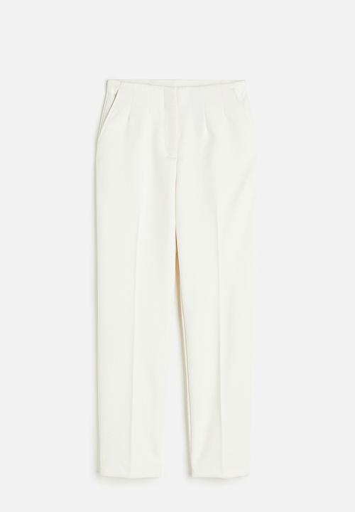 H&M - Tapered trousers - cream 