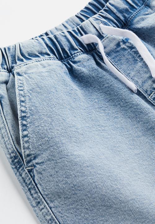 H&M - Loose fit cotton twill joggers - light denim blue