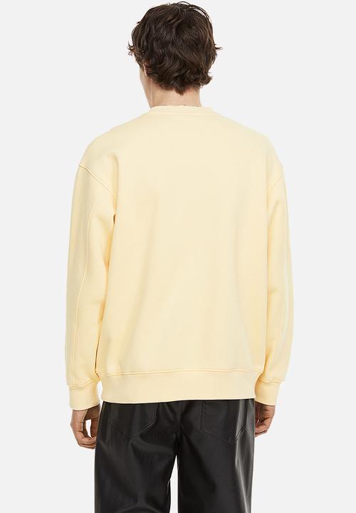 H&M - Relaxed fit appliquéd sweatshirt - light yellow
