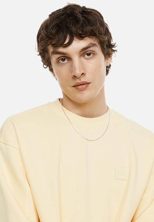 H&M - Relaxed fit appliquéd sweatshirt - light yellow