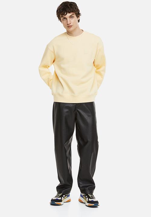 H&M - Relaxed fit appliquéd sweatshirt - light yellow