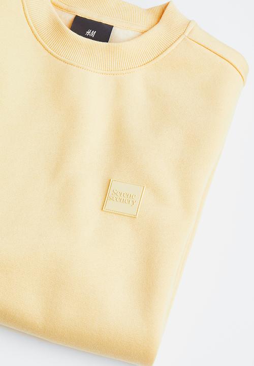 H&M - Relaxed fit appliquéd sweatshirt - light yellow