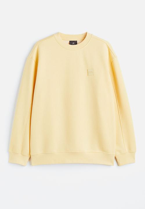 H&M - Relaxed fit appliquéd sweatshirt - light yellow