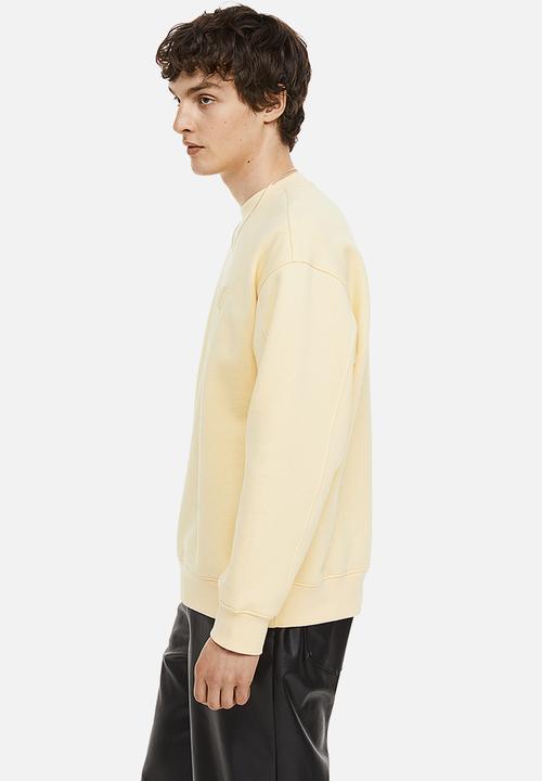 H&M - Relaxed fit appliquéd sweatshirt - light yellow