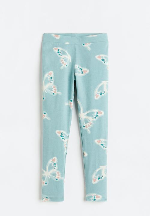 H&M - Leggings - light turquoise / butterflies 