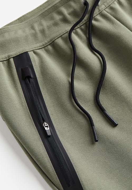 H&M - Drymove™ sports joggers - khaki green 