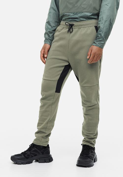H&M - Drymove™ sports joggers - khaki green 