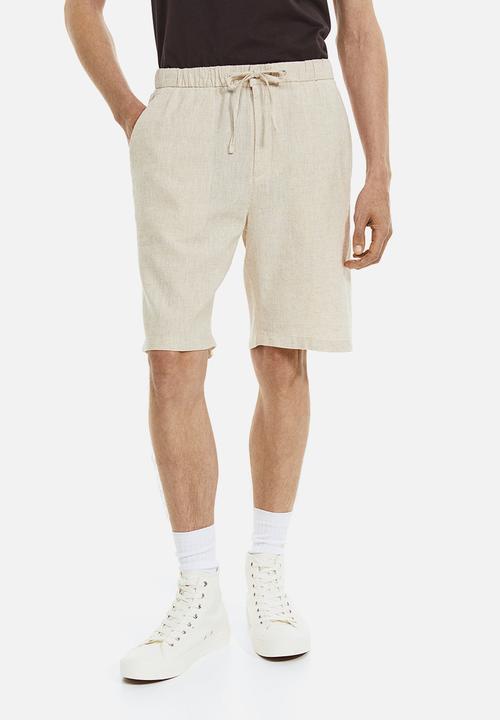 H&M - Regular fit shorts - light beige 