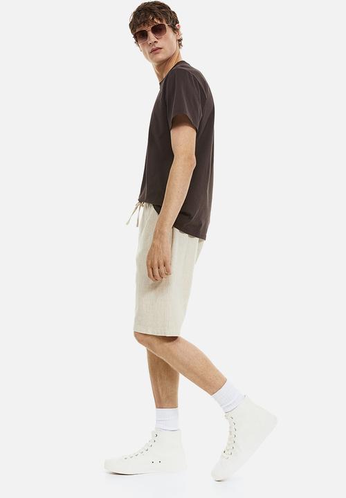 H&M - Regular fit shorts - light beige 