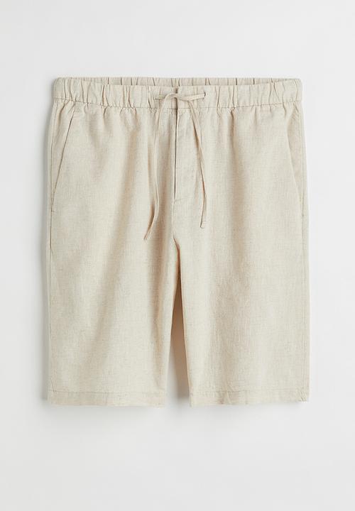 H&M - Regular fit shorts - light beige 