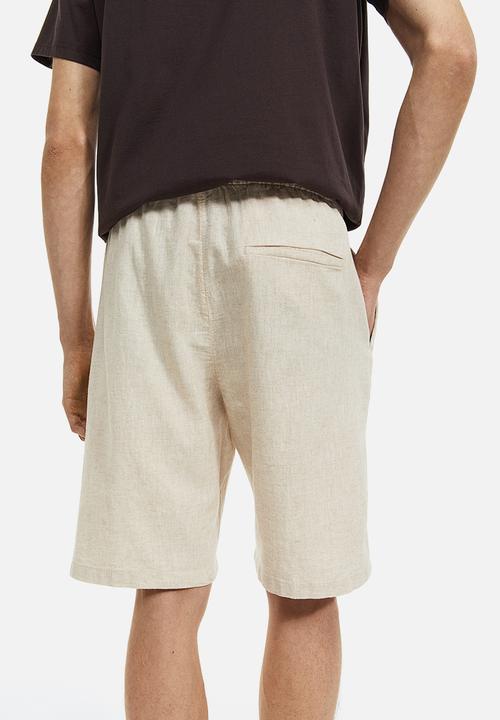 H&M - Regular fit shorts - light beige 