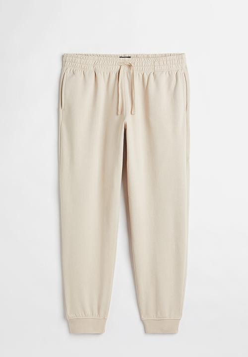H&M - Regular fit sweatpants - cream 