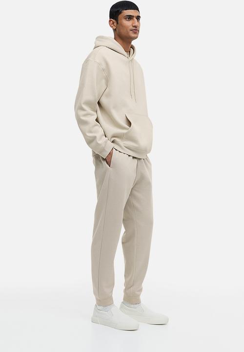 H&M - Regular fit sweatpants - cream 