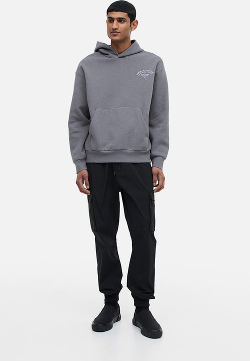 H&M - Relaxed fit printed hoodie - grey / torino tour 