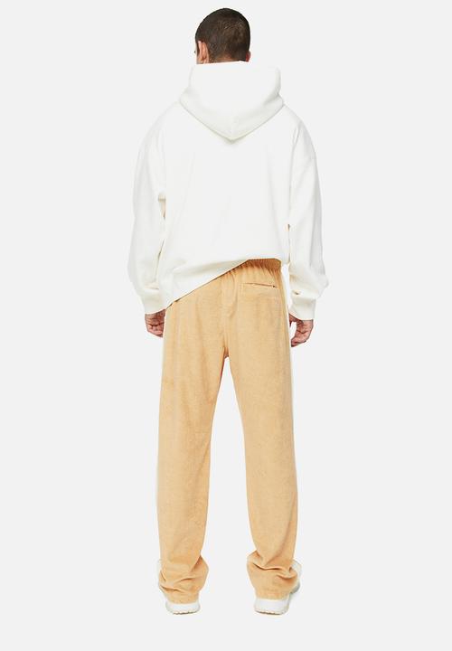H&M - Relaxed fit terry track pants - beige