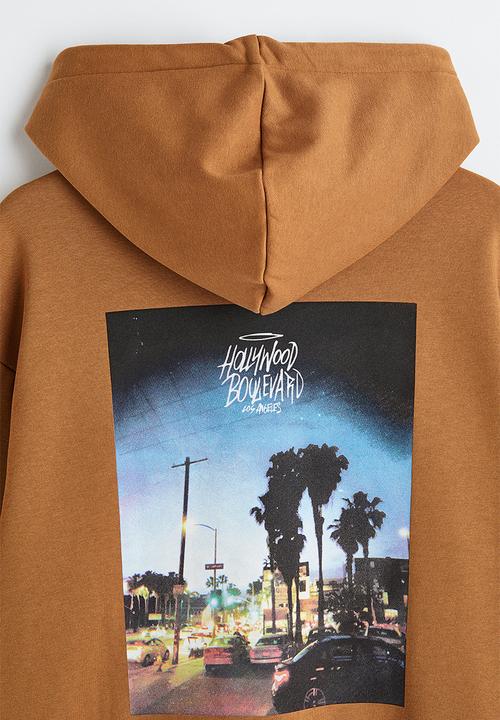 H&M - Relaxed fit printed hoodie - brown / hollywood 