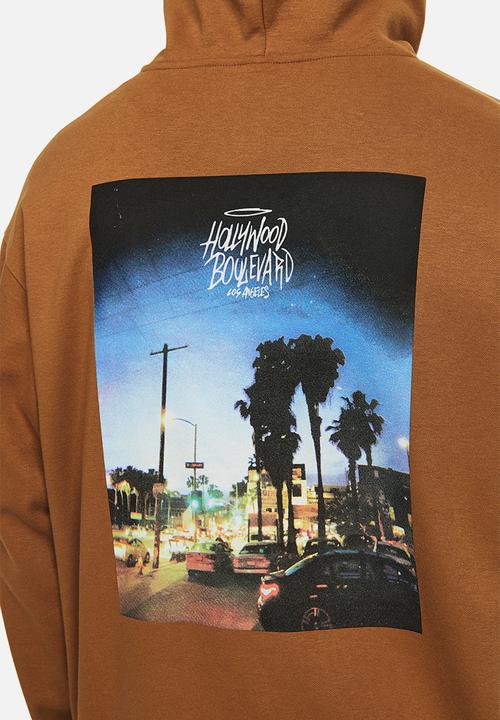 H&M - Relaxed fit printed hoodie - brown / hollywood 