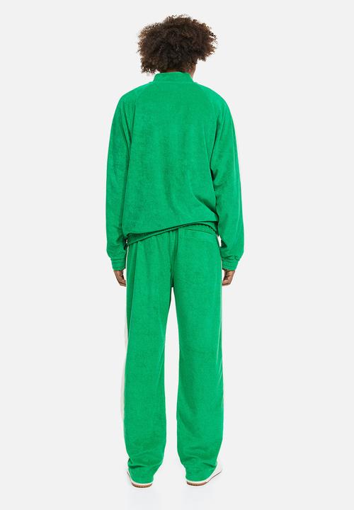 H&M - Relaxed fit terry track pants - bright green 