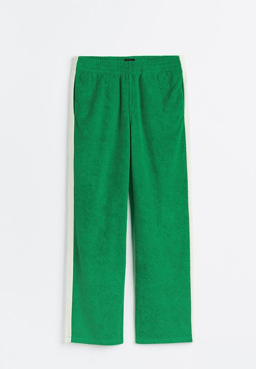 H&M - Relaxed fit terry track pants - bright green 