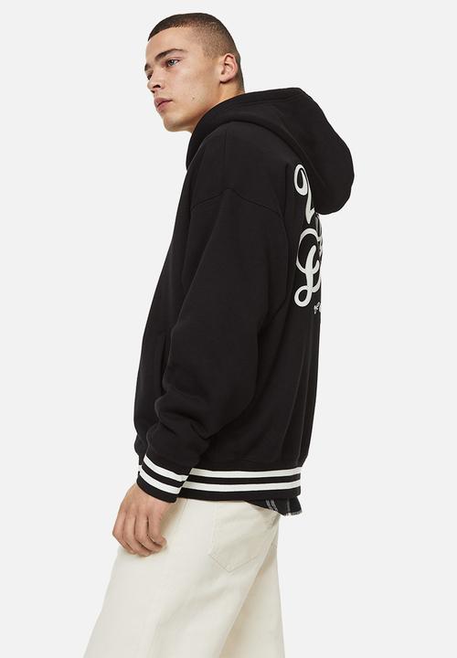 H&M - Oversized fit zip-through hoodie - black/varsity detroit 