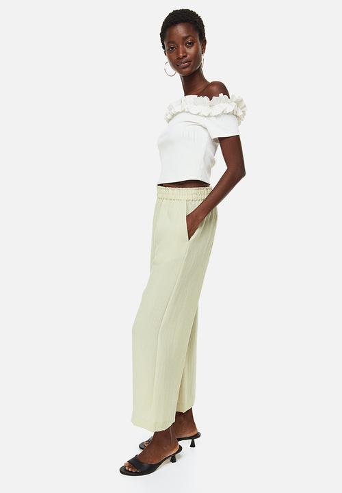 H&M - Straight trousers - light green
