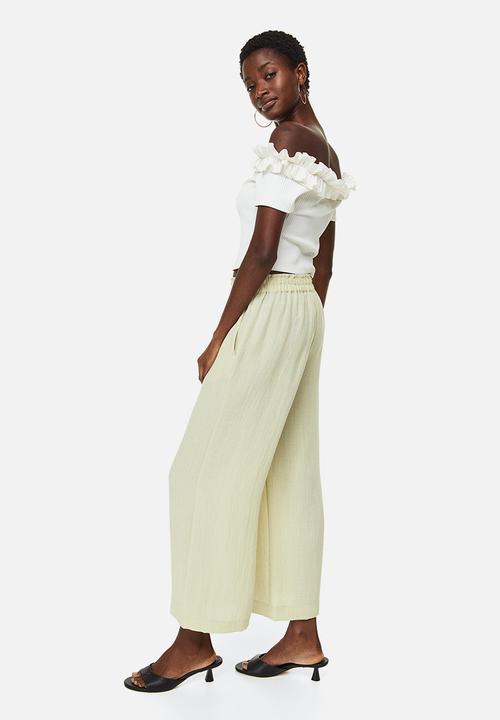 H&M - Straight trousers - light green