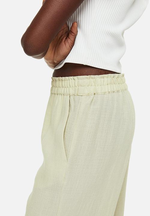H&M - Straight trousers - light green
