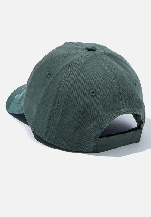 Cotton On - Kids licensed cap - lcn uni jurassic park/swag green