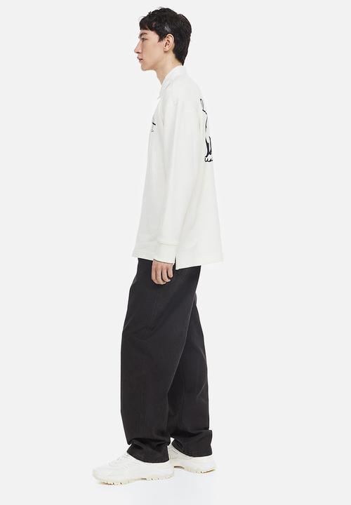 H&M - Relaxed fit printed polo shirt - cream/yale 