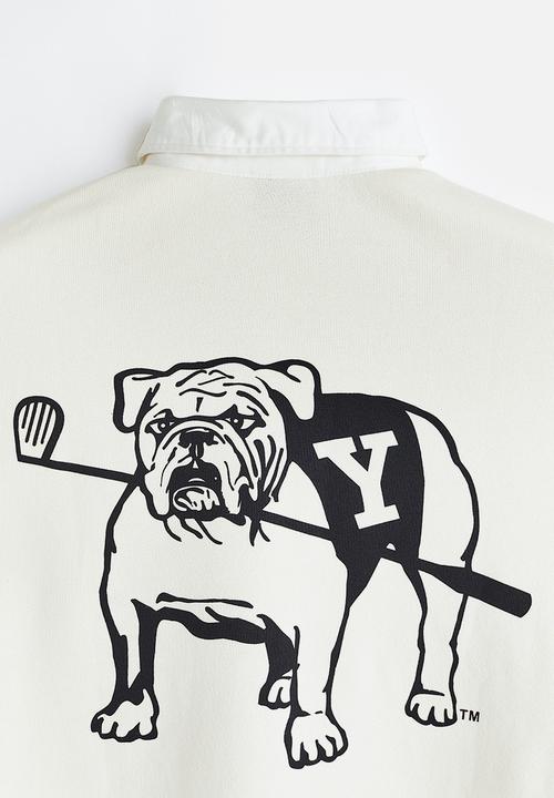 H&M - Relaxed fit printed polo shirt - cream/yale 