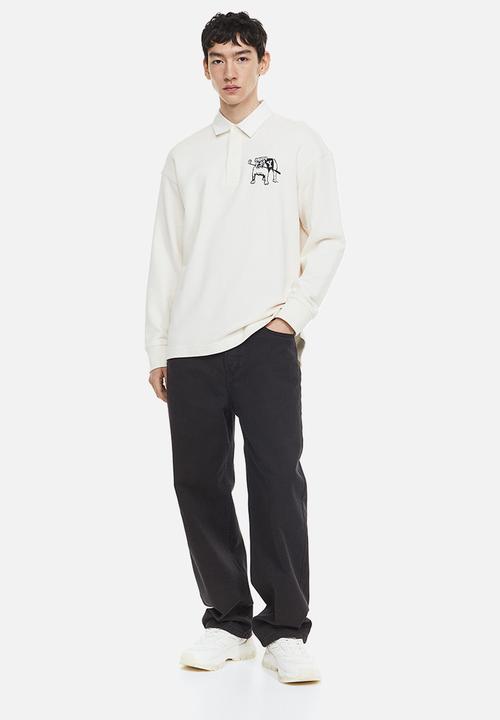 H&M - Relaxed fit printed polo shirt - cream/yale 