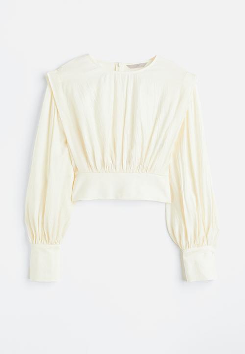 H&M - Defined-shoulder crêpe blouse - cream