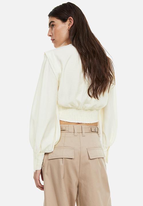 H&M - Defined-shoulder crêpe blouse - cream