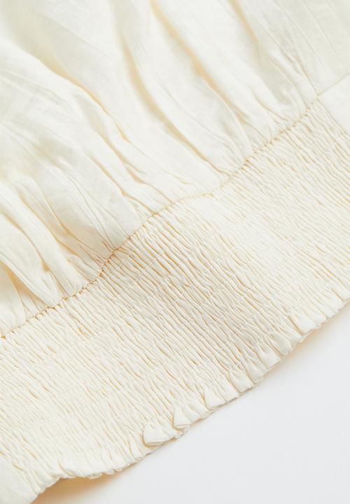H&M - Defined-shoulder crêpe blouse - cream