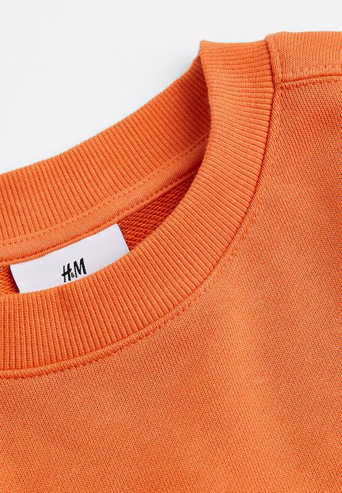 H&M - Relaxed fit printed sweatshirt - orange/connect