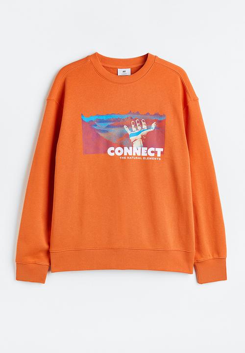 H&M - Relaxed fit printed sweatshirt - orange/connect